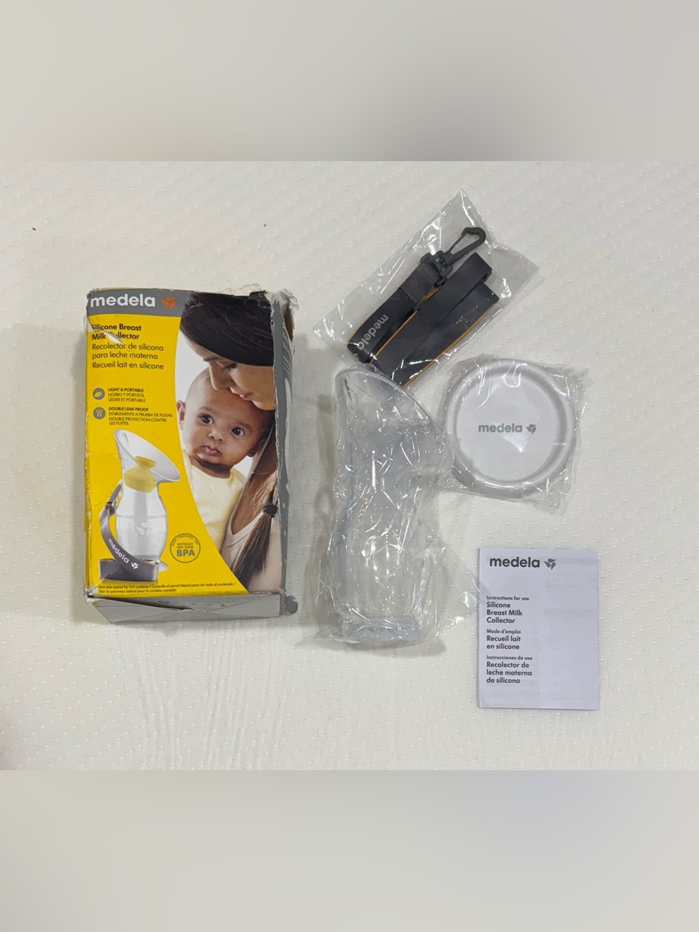 3 for $25 Medela Yellow and White Silicone Breast Milk Collector Set